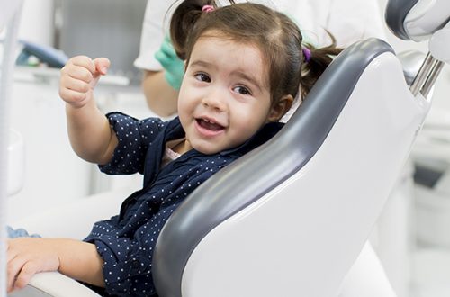 Little girl at the dentist checkup
